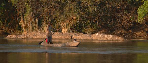 Popa Falls Man In Boat